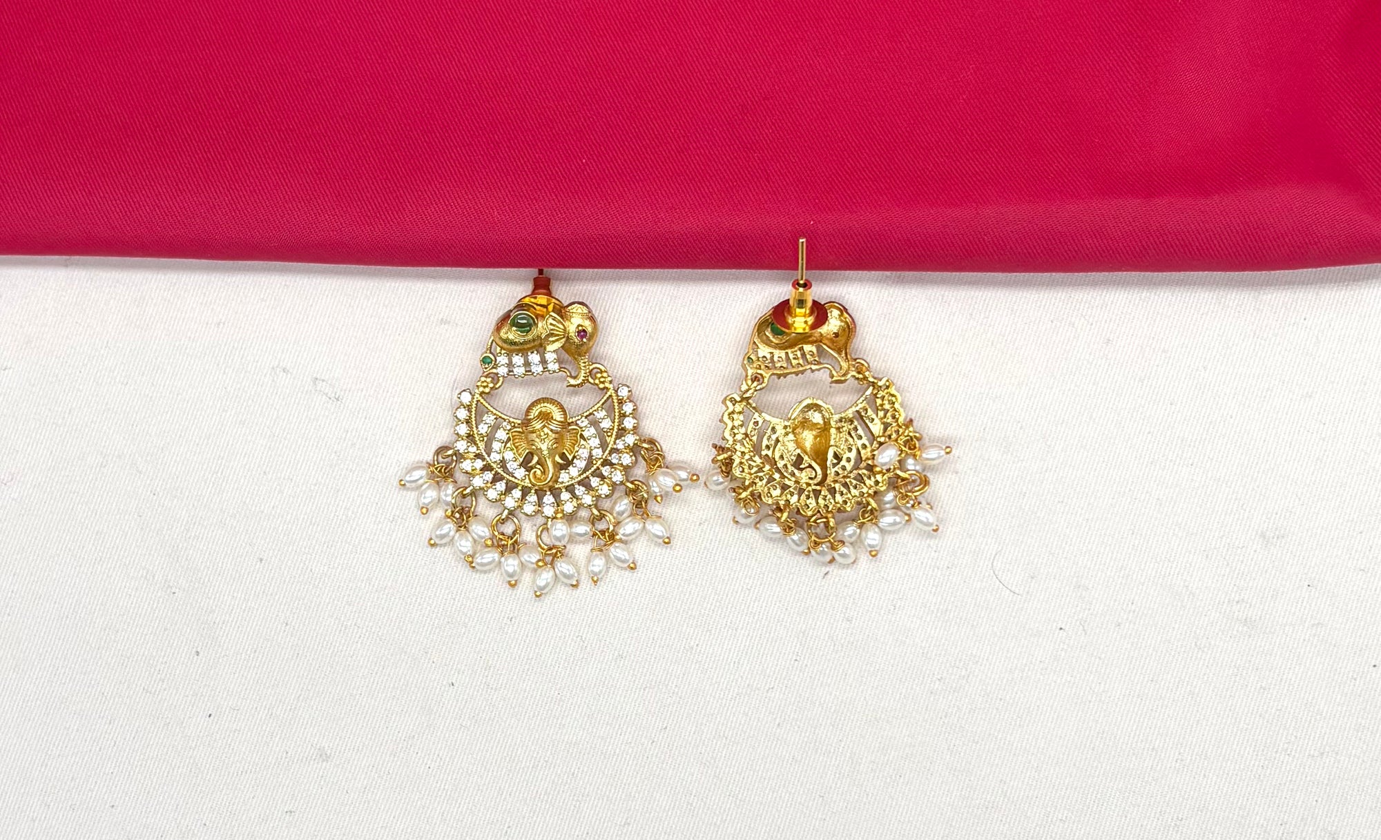 Gold finishing Lord Ganesha Pendant with Elephant design and Ad stones Short Necklace