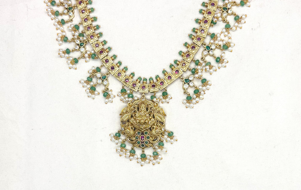 Jadau Kundan Beautifully designed with White pearls Lord Lakshmi pendant Short Necklace