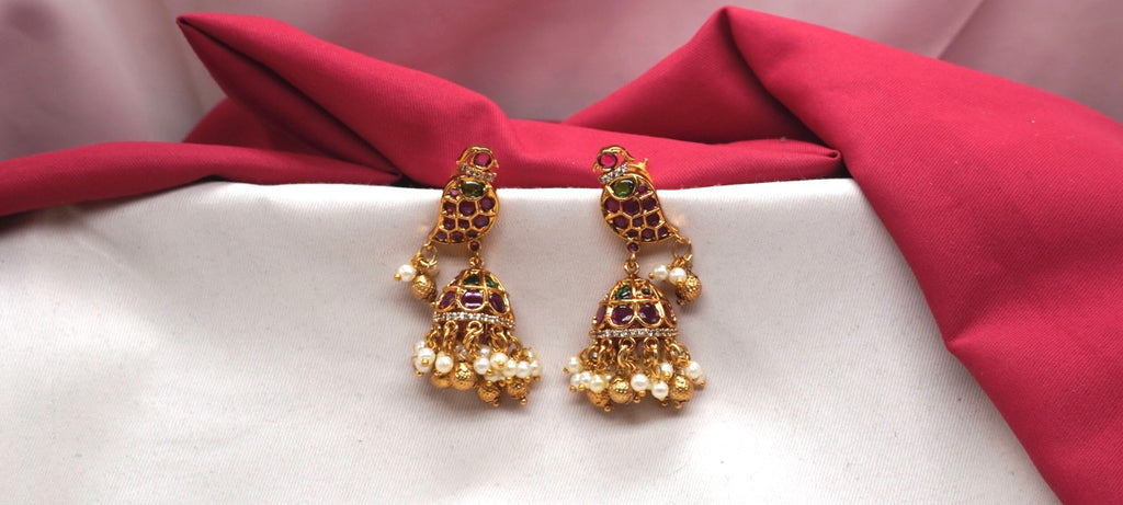 Matte finish American Diamond stones and pearls Bird design Jhumka Earrings