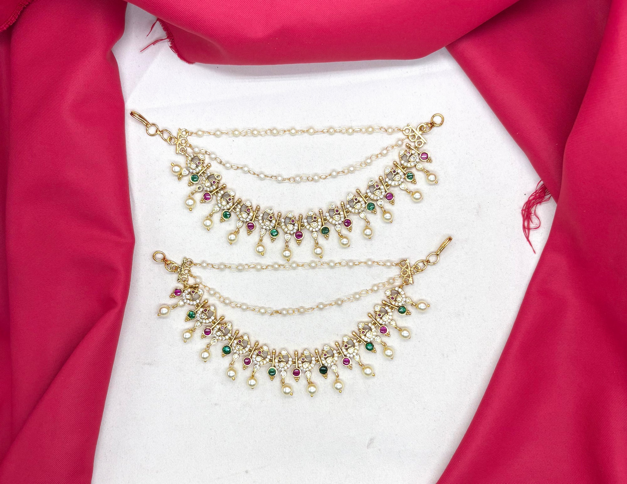 Matte finishing peacock design with American Diamonds Champaswaralu