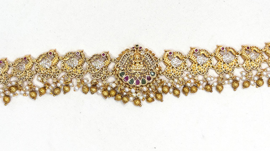 Matte finishing peacock design with multi-stones chain vaddanam