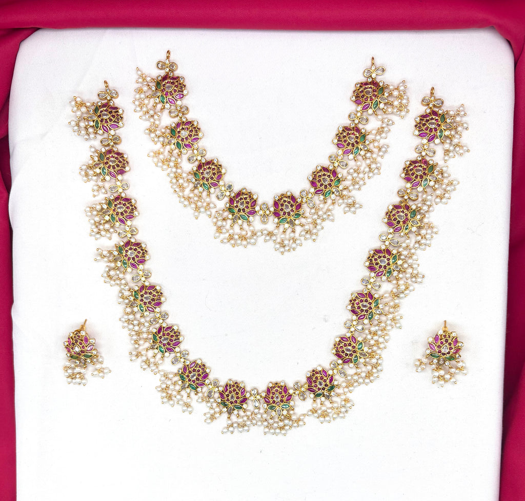 Beautifully designed with Lotus flowers and Guttapusalu clustered pearls Combo set