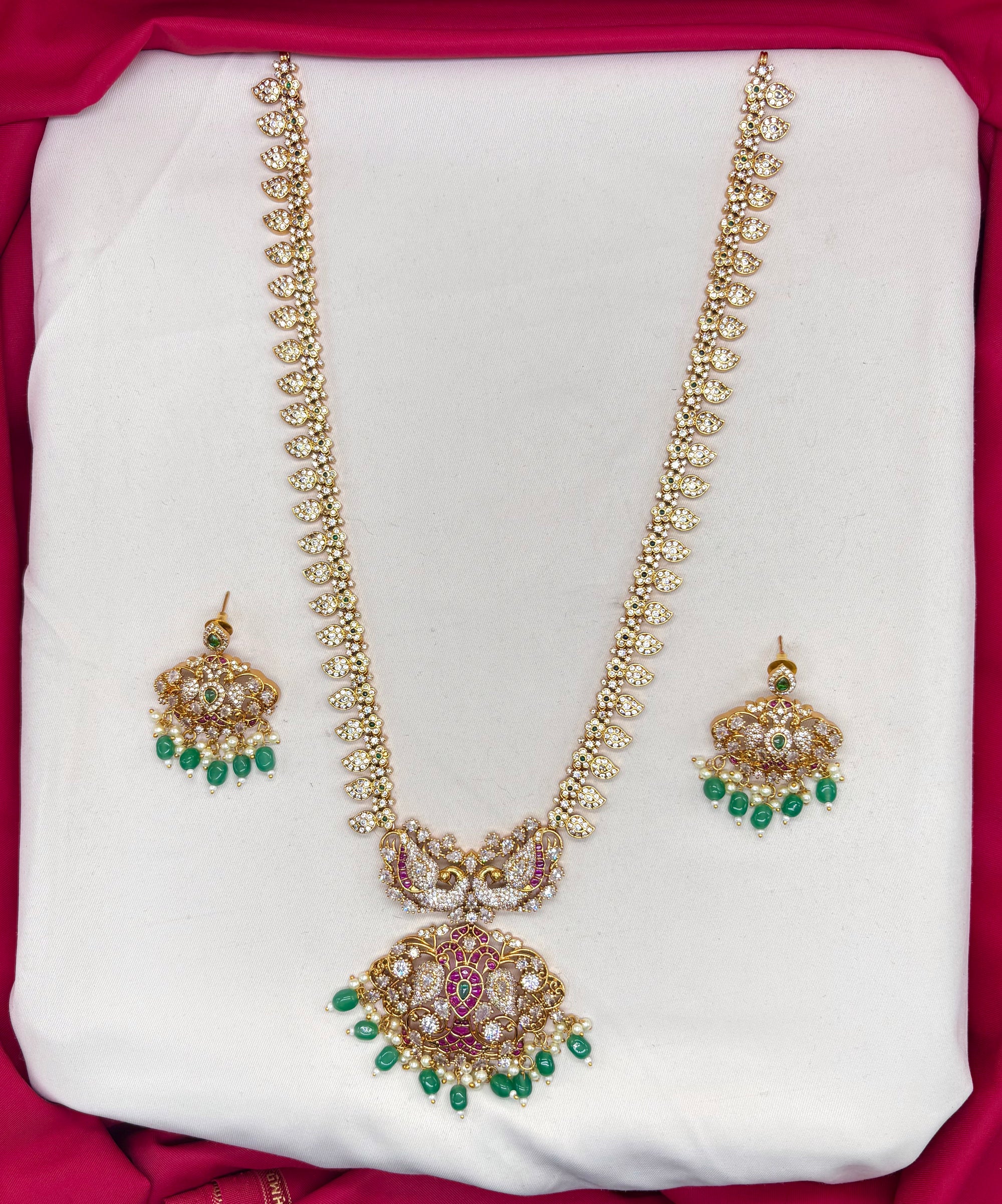 Jadau Kundan finishing with American Diamonds peacock design long necklace