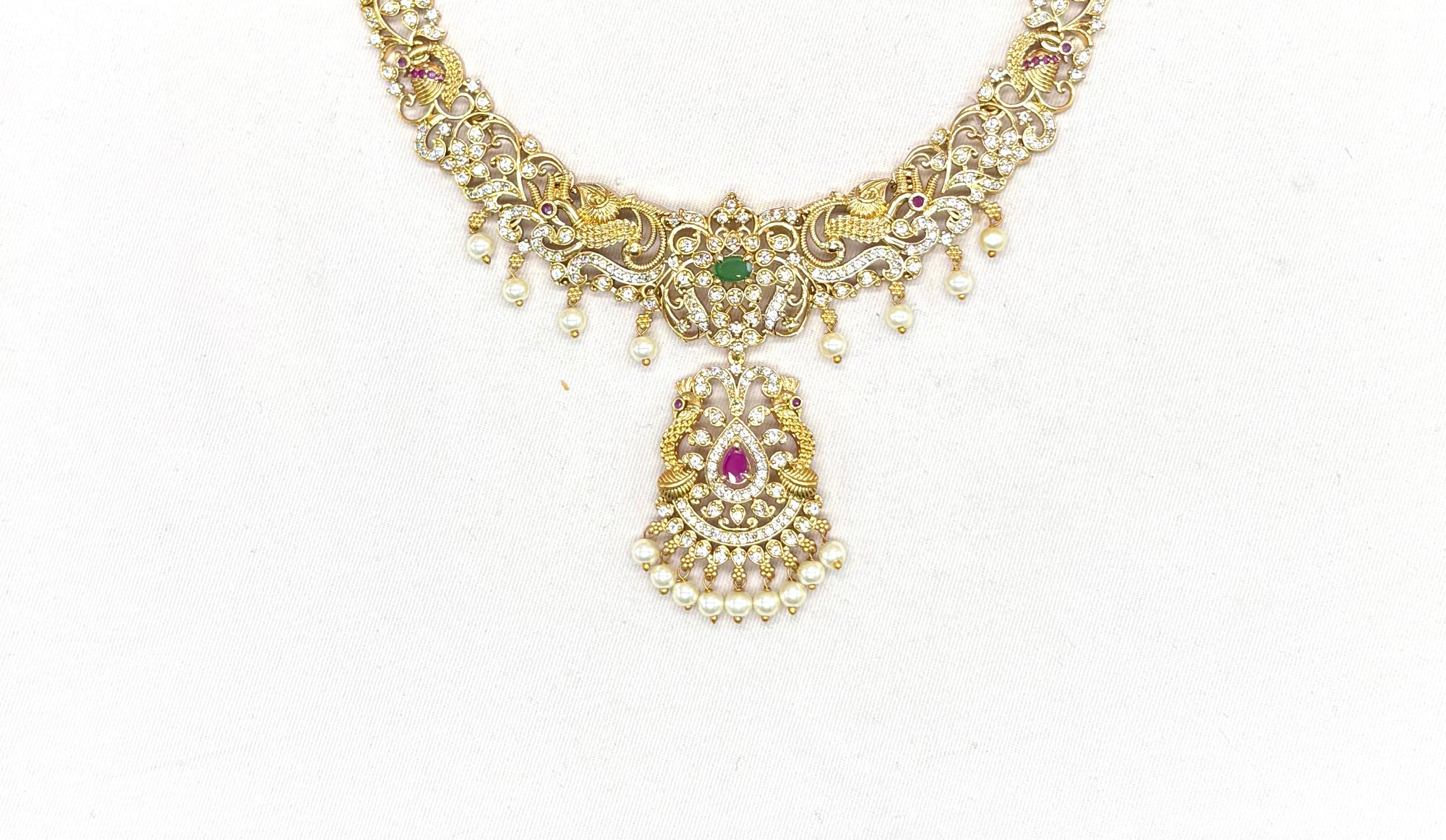 Matte finishing peacock design with White pearls Short Necklace