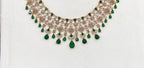 Premium matte finish American Diamonds flower design with Green Stones Short Necklace