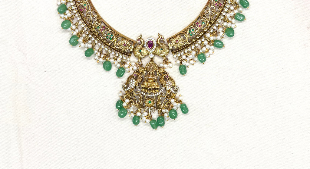 Nakshi finishing floral design with Lord Lakshmi pendant Green Beads Short Necklace
