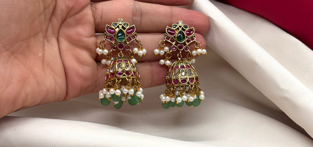 Jhumka emerald Kempu stones with pearl and green bead embellishment earrings