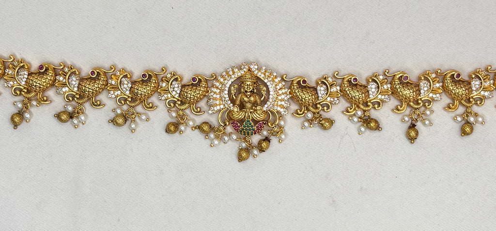 Matte finishing lord Lakshmi with AD stones Peacock design Chain Vaddanam
