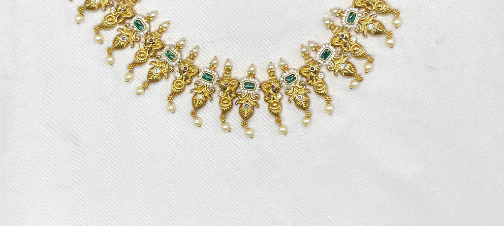 Matte finishing Elephant with leaf finishing design and white pearls Short Necklace