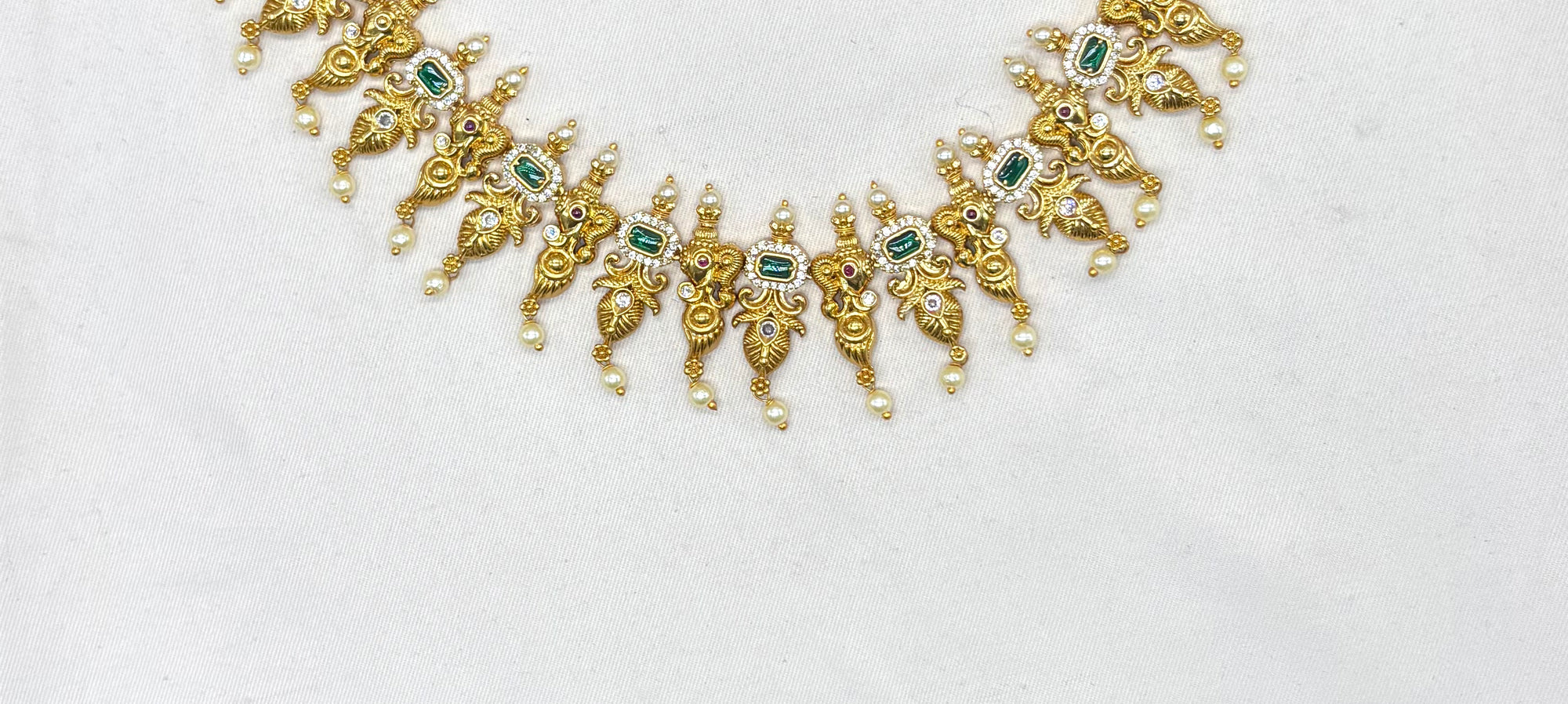 Matte finishing Elephant with leaf finishing design and white pearls Short Necklace