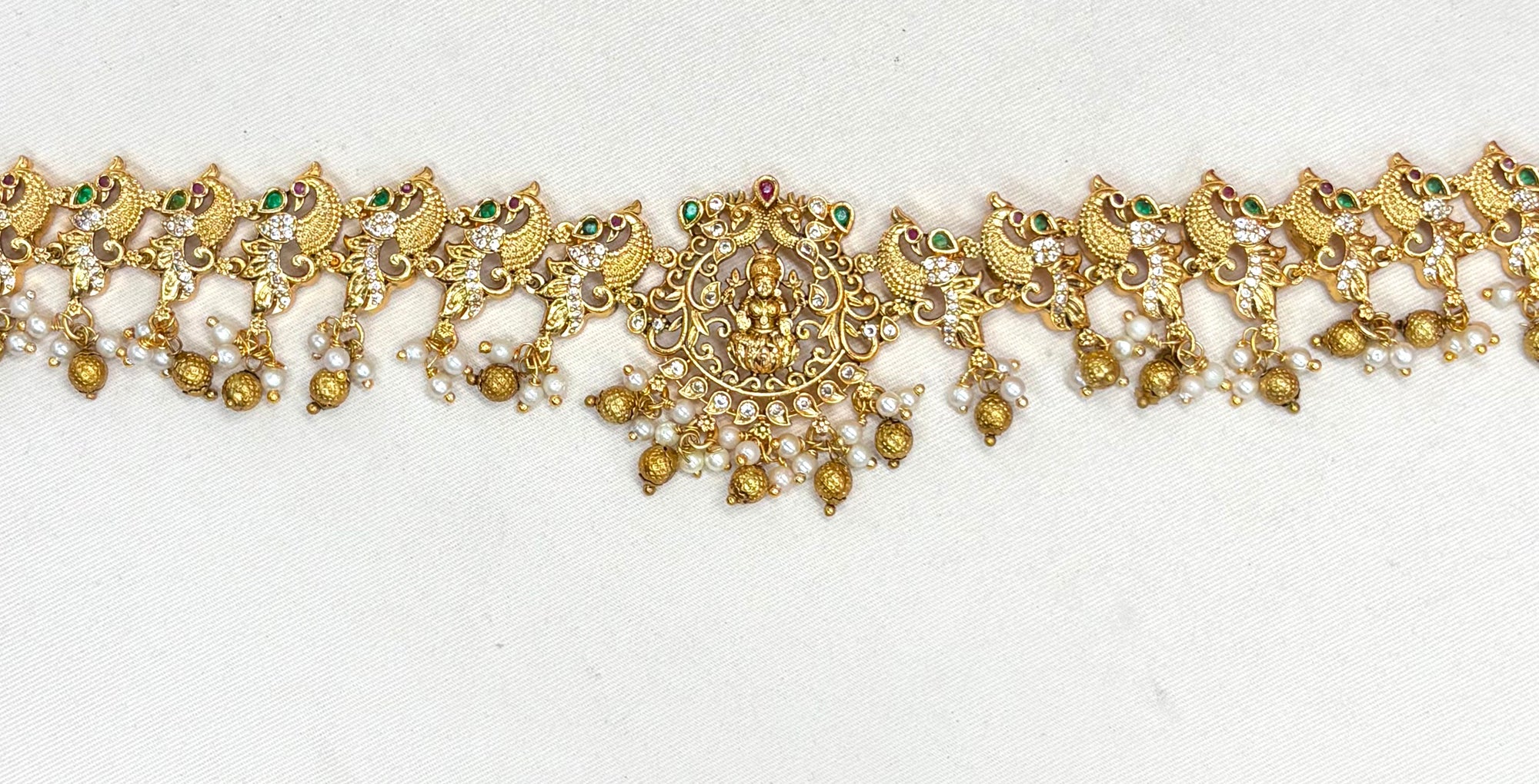 Matte finishing peacock design with golden balls chain vaddanam