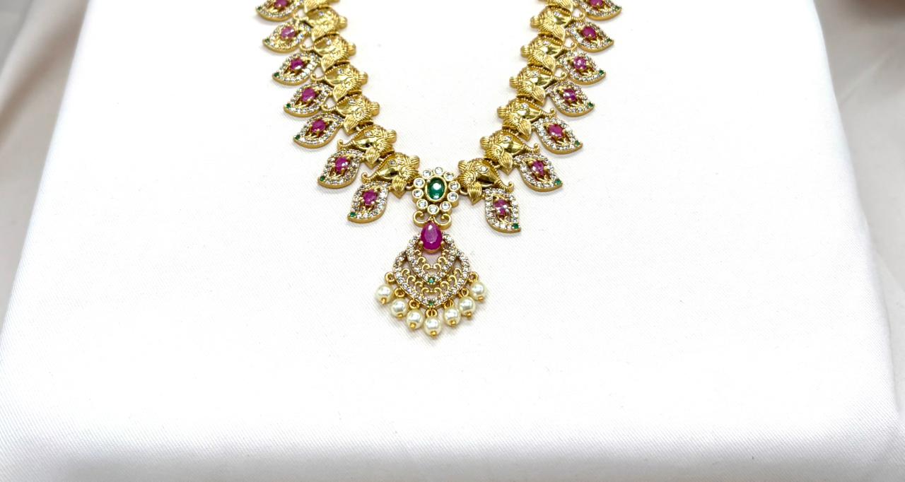 Matte finishing with Lord Ganesh Designed Long Haram