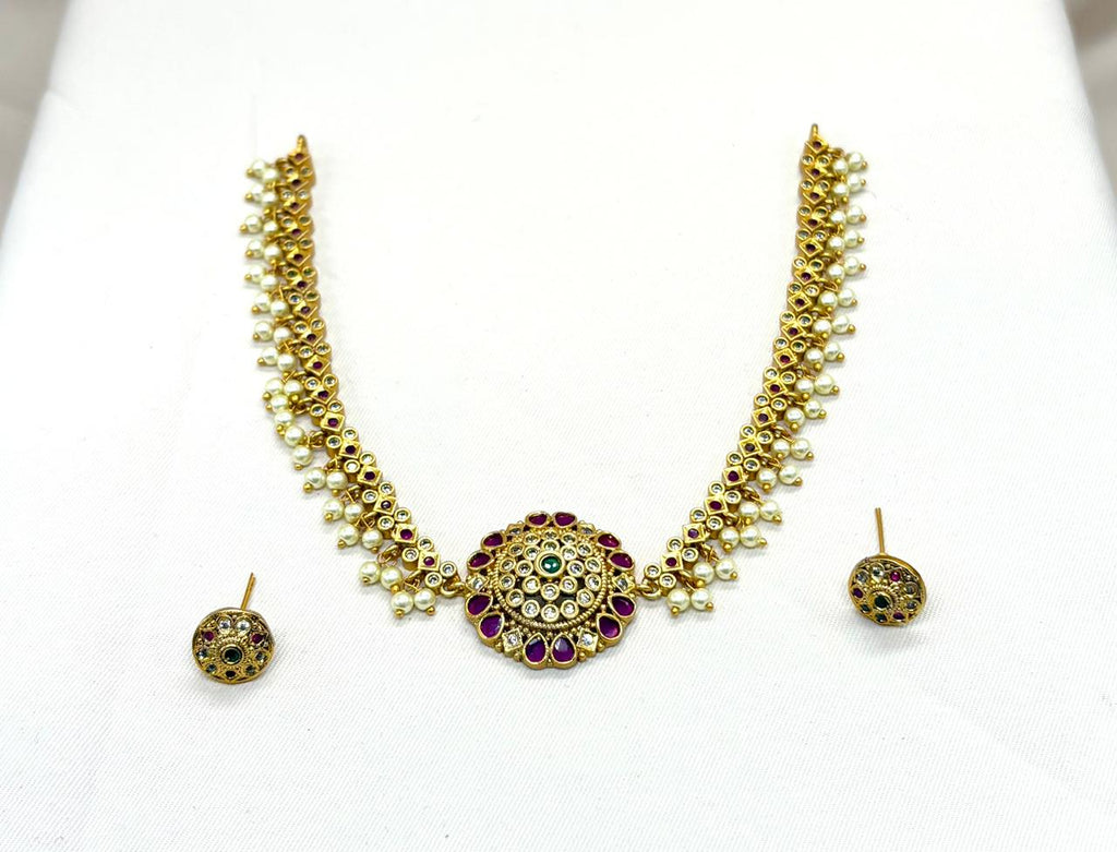 Gold finishing with white pearls  Short Necklace