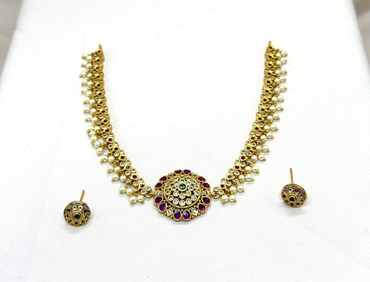 Gold finishing with white pearls  Short Necklace