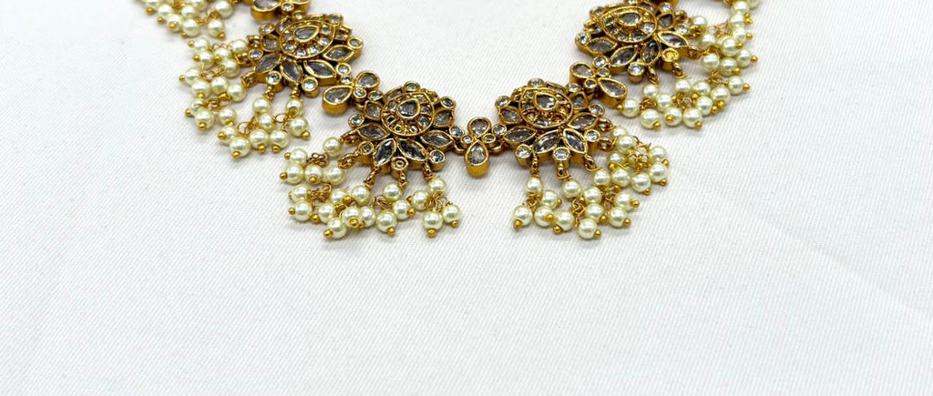 Gold finishing Flower Designed White Stones Short Necklace