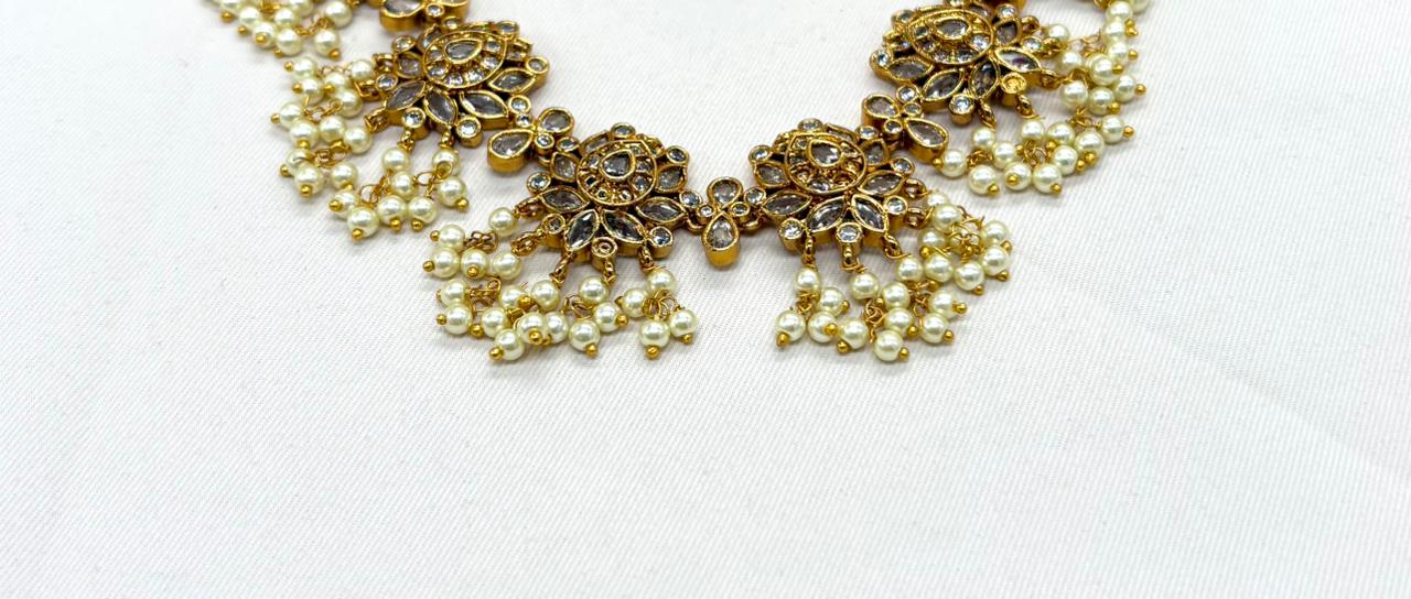 Gold finishing Flower Designed White Stones Short Necklace