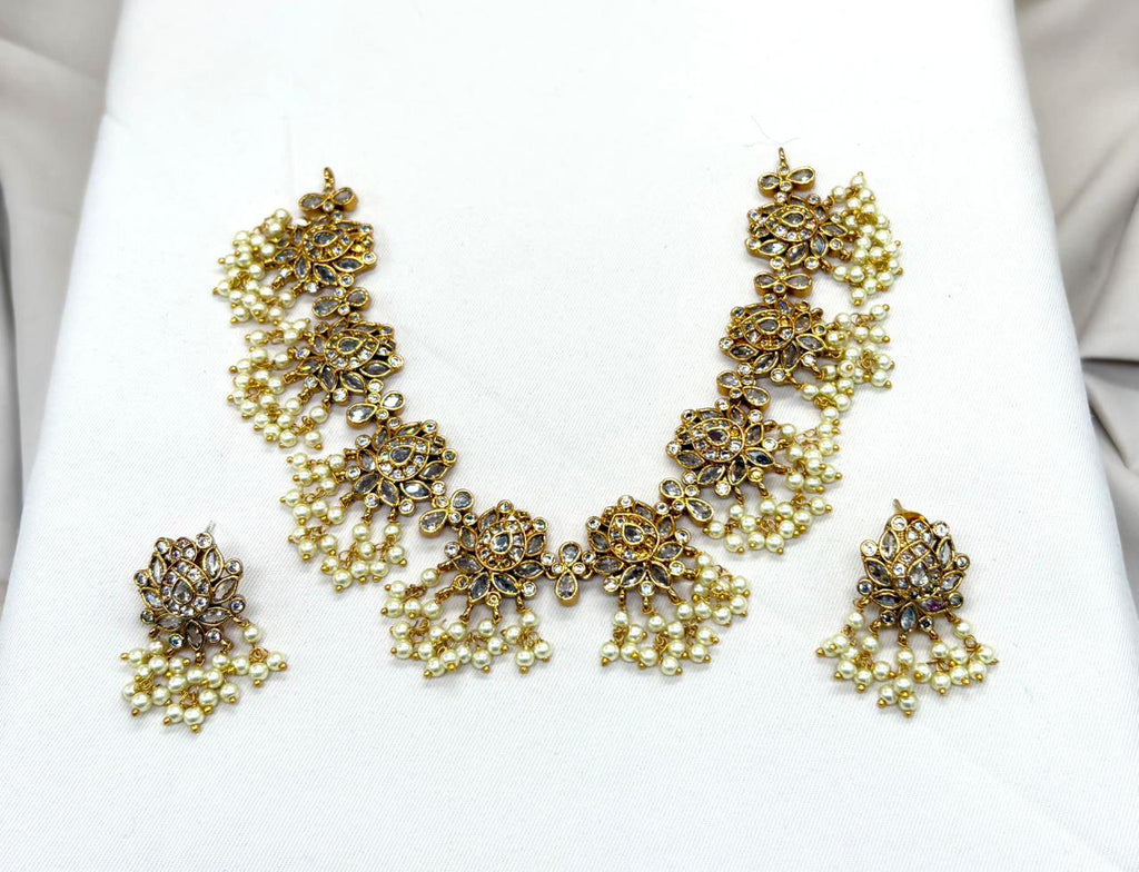 Gold finishing Flower Designed White Stones Short Necklace