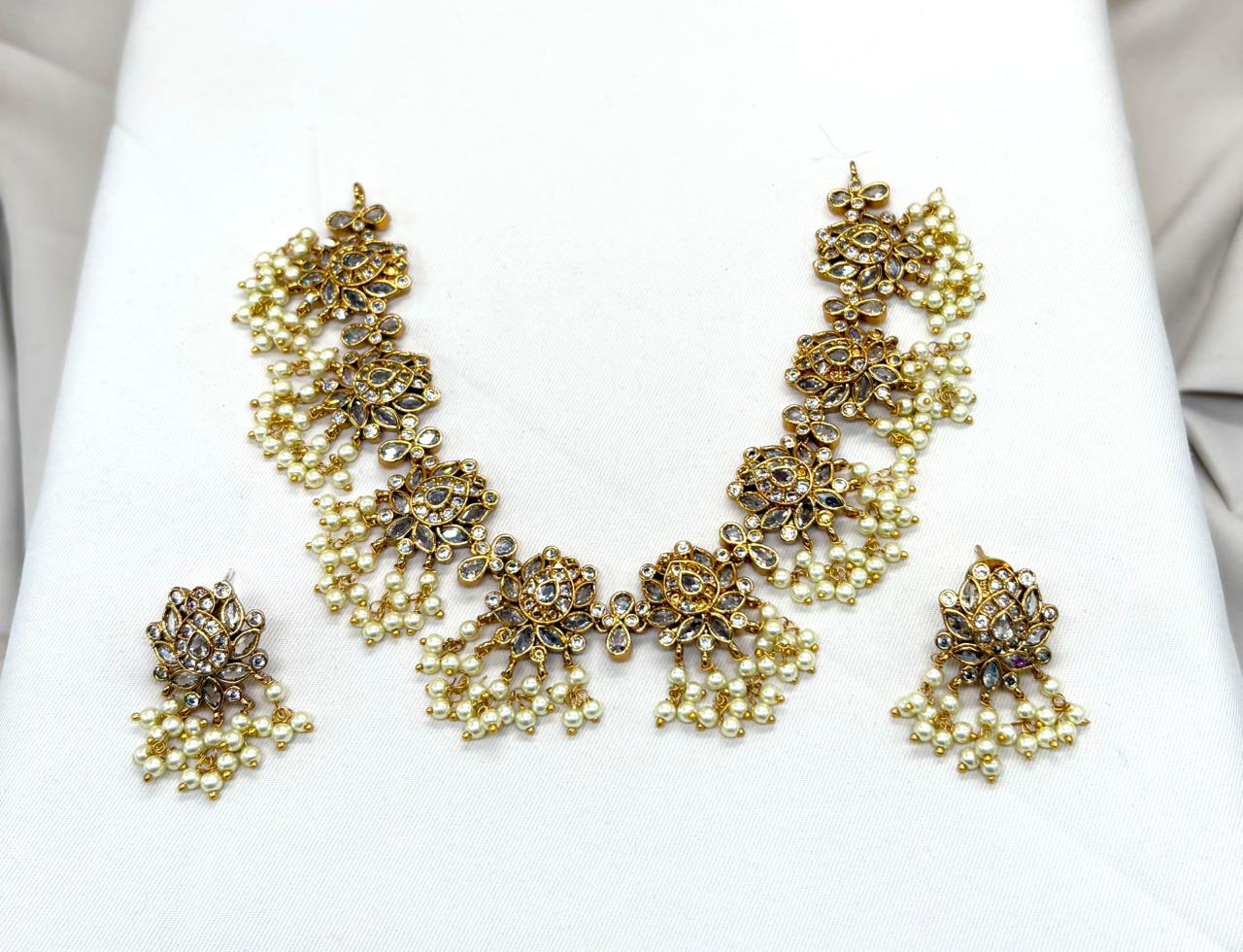 Gold finishing Flower Designed White Stones Short Necklace