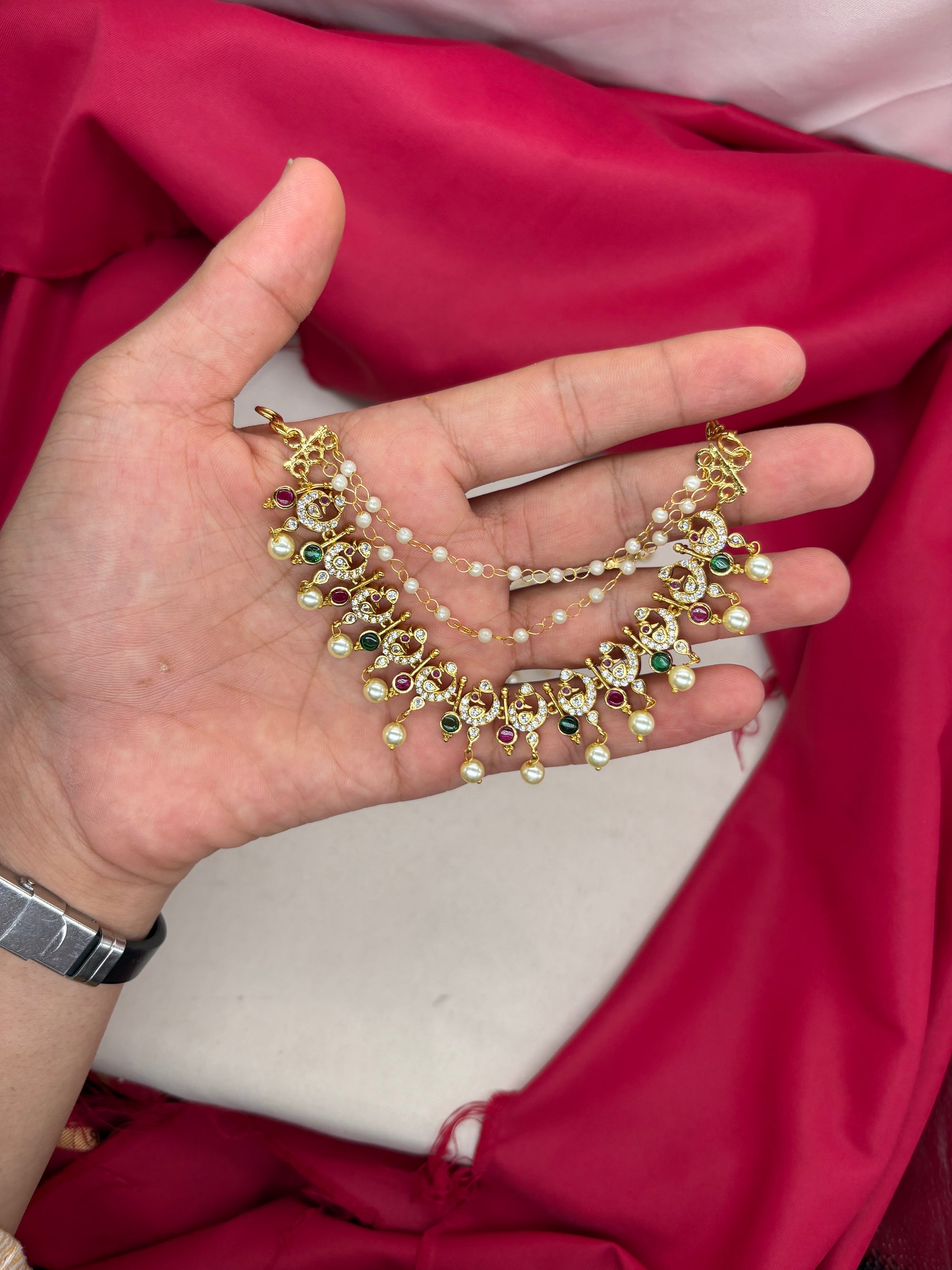 Matte finishing peacock design with American Diamonds Champaswaralu