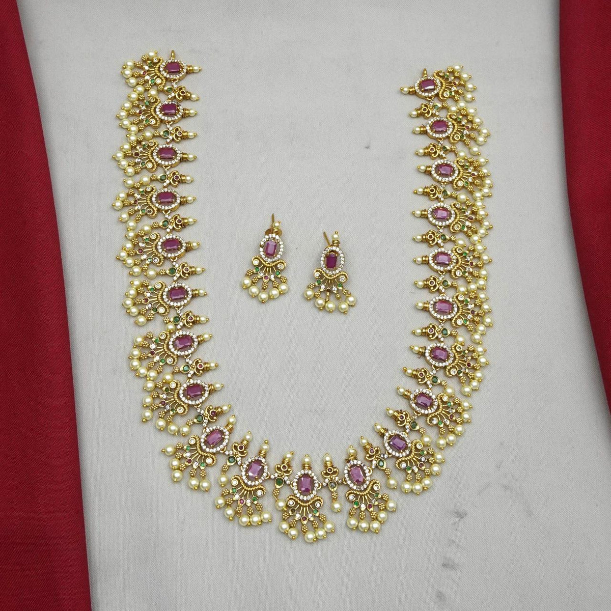 Matt Finished Long Haram Necklace Set With Ruby-Style Stones & Pearl Work