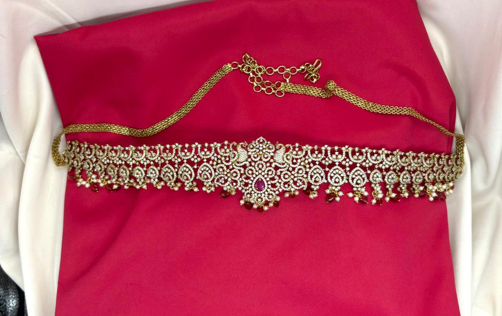 Victorian finishing with Maroon stones and peacock deigned  Chain Vaddanam