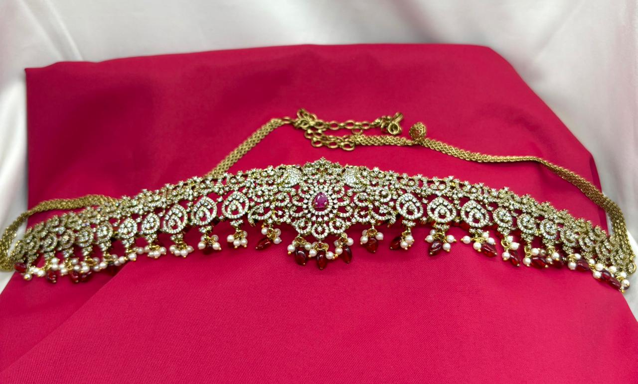Victorian finishing with Maroon stones and peacock deigned  Chain Vaddanam