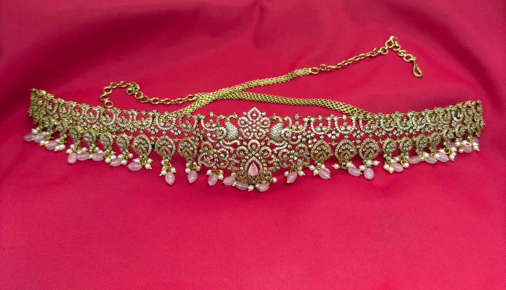 Victorian finishing with pink stones and peacock deigned  Vaddanam