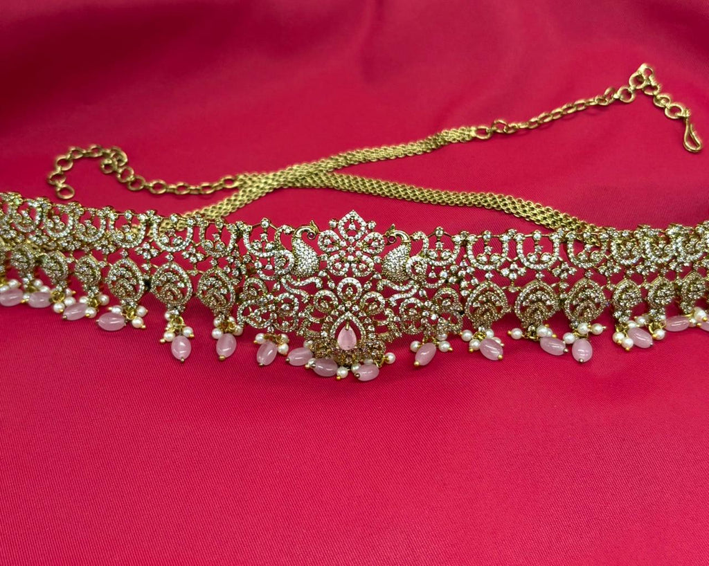 Victorian finishing with pink stones and peacock deigned  Vaddanam