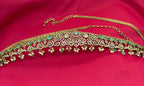 Victorian finishing with Mint-Green stones and peacock deigned Chain Vaddanam