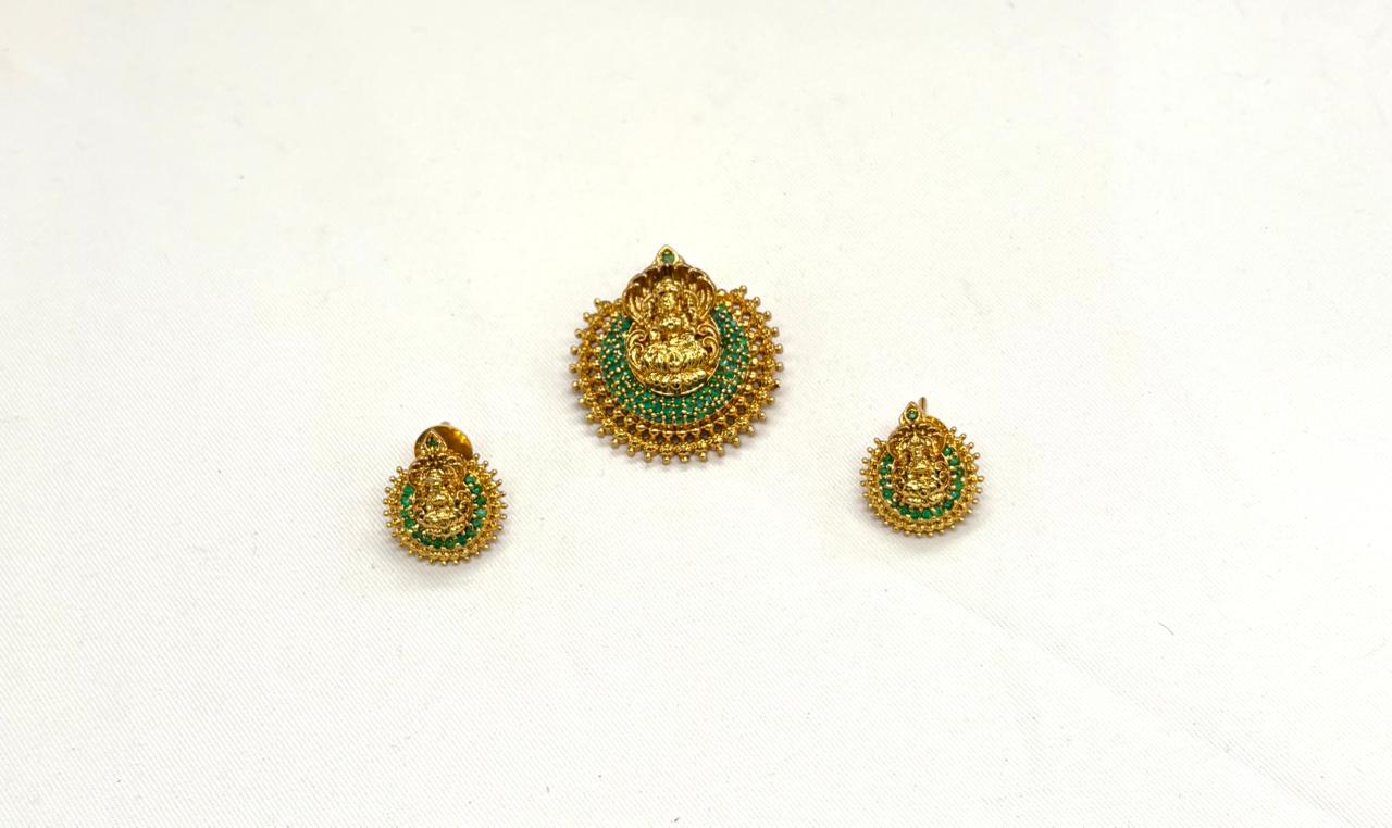 Matte finishing Lakshmi Devi Locket with Green stones