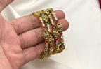Matte finishing with lord Lakshmi white stones bangle