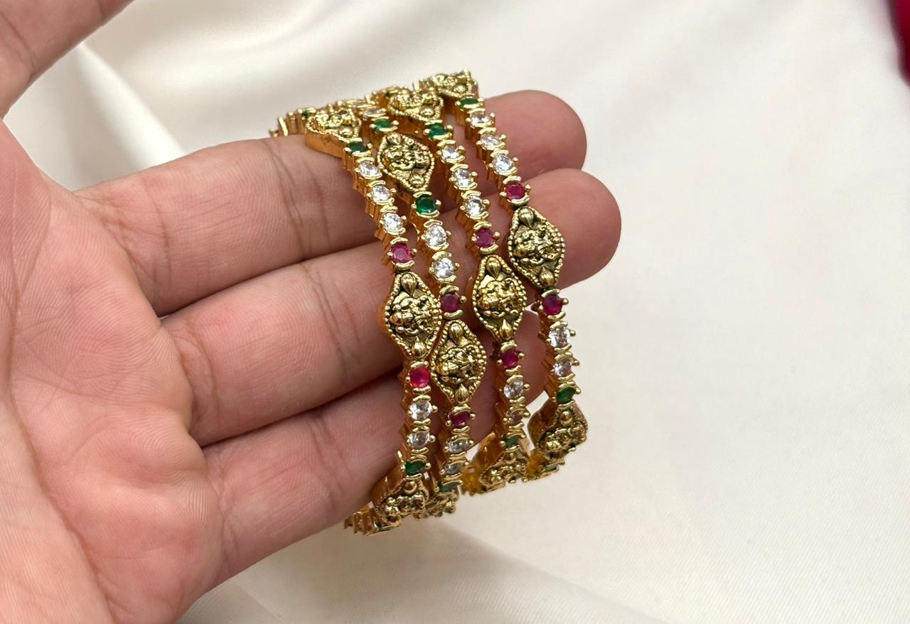 Matte finishing with lord Lakshmi white stones bangle