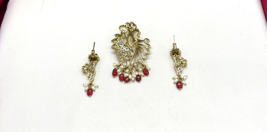 Victorian finishing peacock designed with red monalisa beads Locket