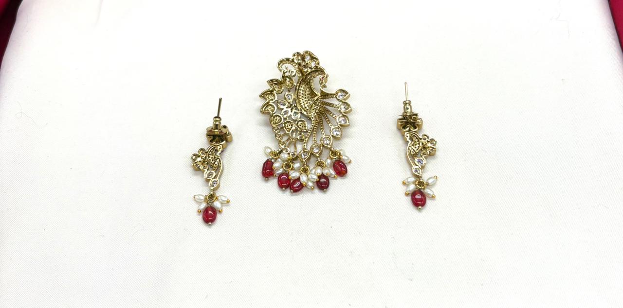 Victorian finishing peacock designed with red monalisa beads Locket