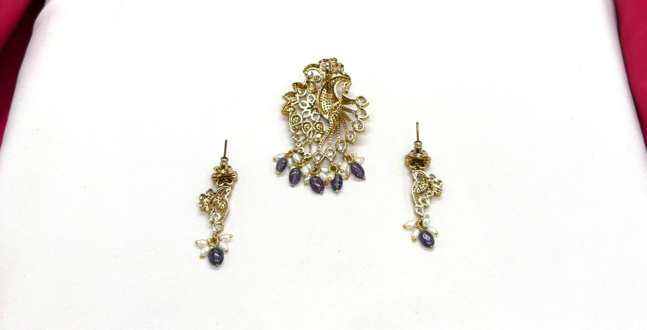 Victorian finishing peacock designed with purple monalisa beads Locket