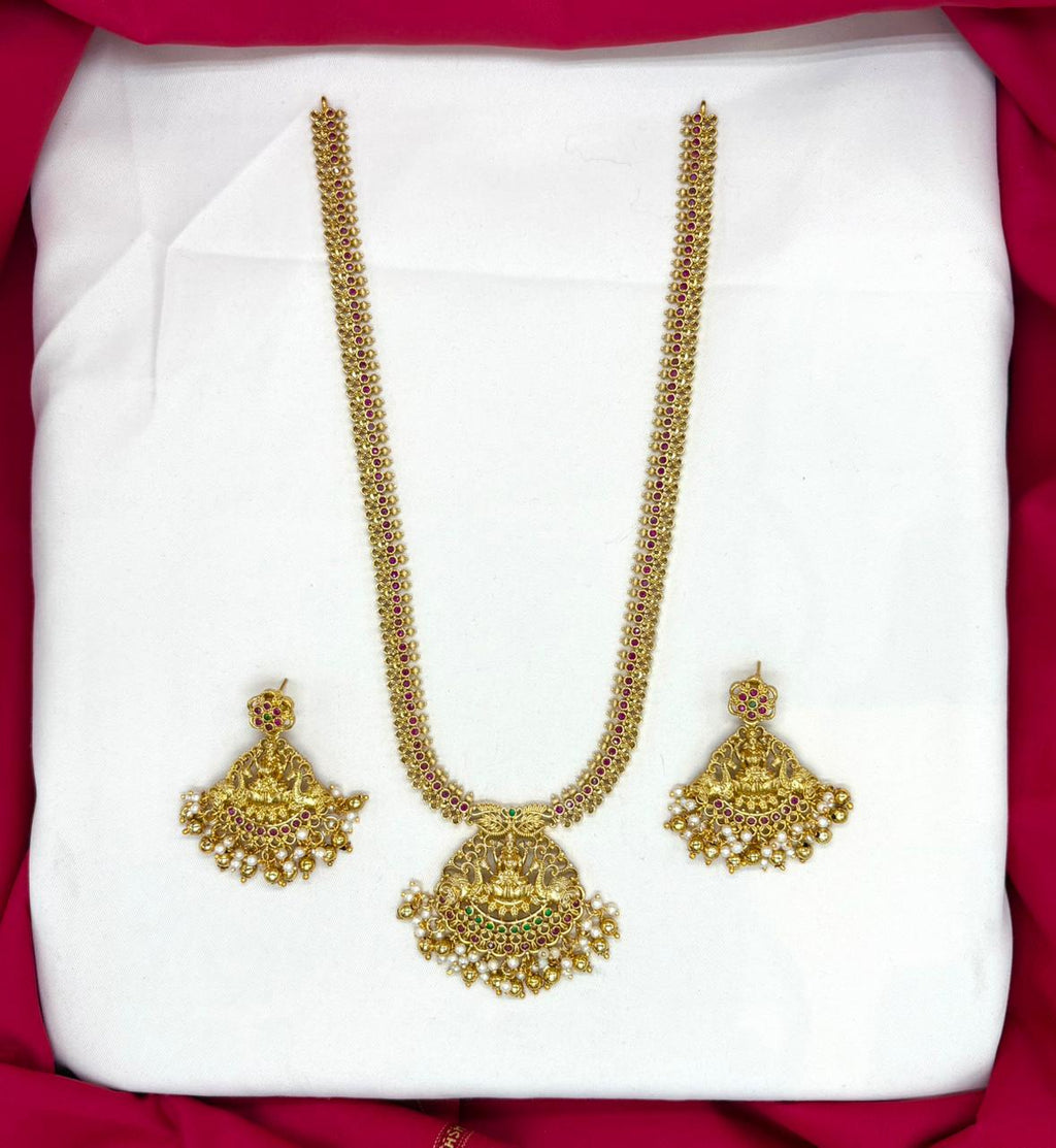 Matte finishing lord Lakshmi pendent with small stones long Haram