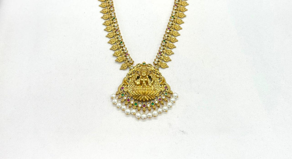 Matte finishing lord Lakshmi with white stones long Haram