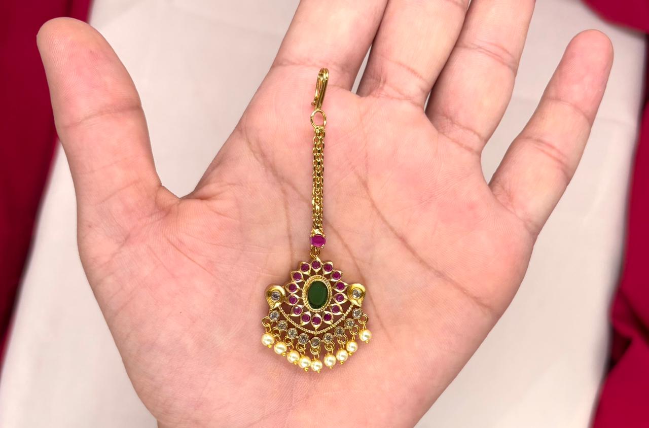 matte finishing pink stones and pearl drop Maang Tikka