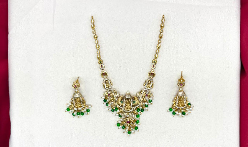 Matte finishing lord Lakshmi with peacock Designed Short Necklace