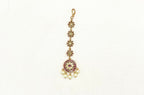 Ruby-colored emerald stone pearl drop maang tikka