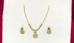 Matte finishing Lakshmi motifs emerald pink stones short Necklace