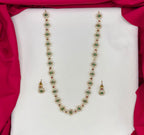 Matte finishing floral design Green-colored stones Long Necklace