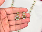 Matte finishing floral design Green-colored stones Long Necklace