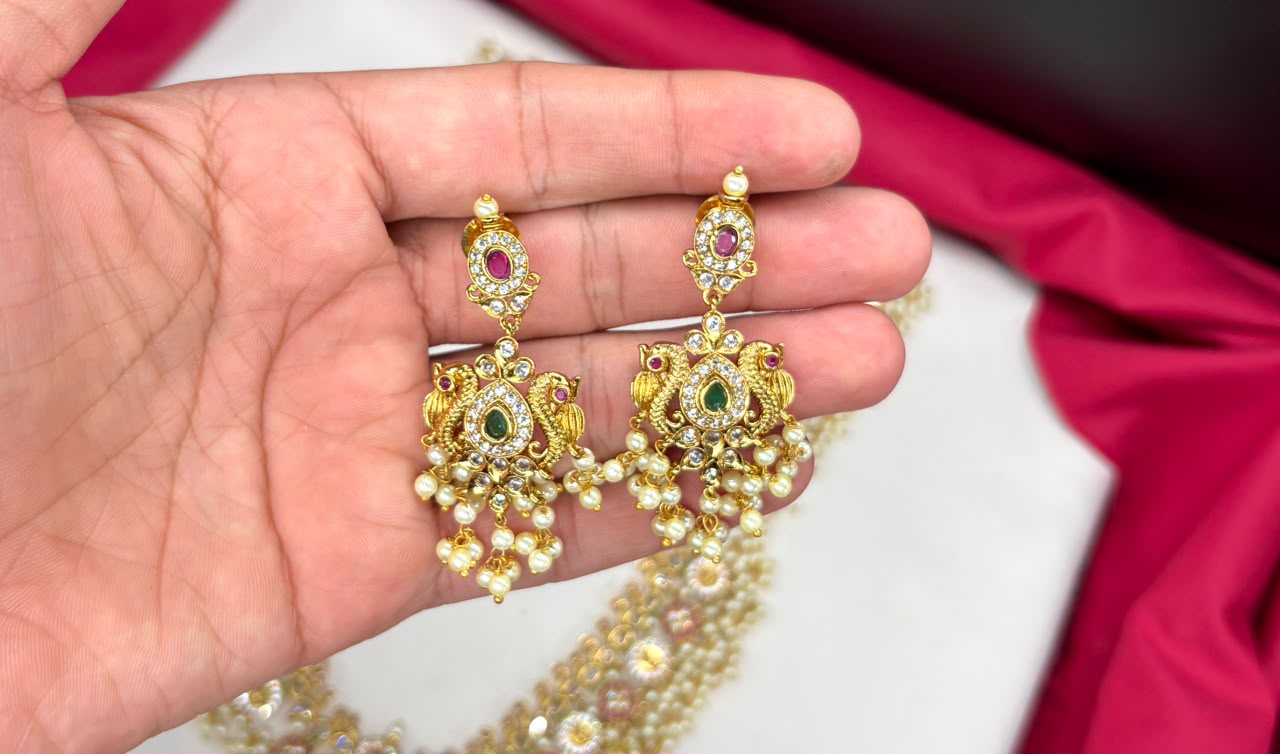 Matte finishing features intricate Kundan work pearl beads Long Harman
