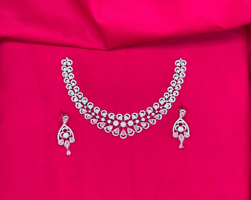 Silver finishing features white rhodium plated zircon with Baby-pink stones short Necklace