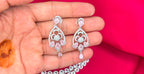 Silver finishing features white rhodium plated zircon with Baby-pink stones short Necklace