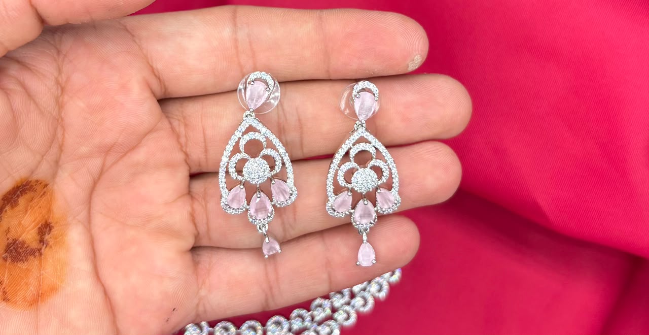 Silver finishing features white rhodium plated zircon with Baby-pink stones short Necklace