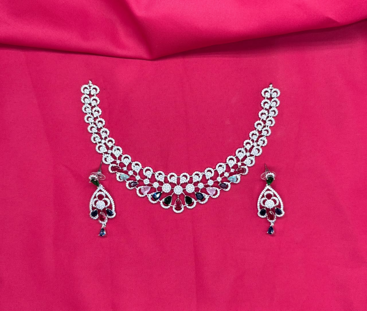 Silver finishing features white rhodium plated zircon with Multi-stones short Necklace