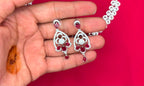Silver finishing features white rhodium plated zircon with Red stones short Necklace