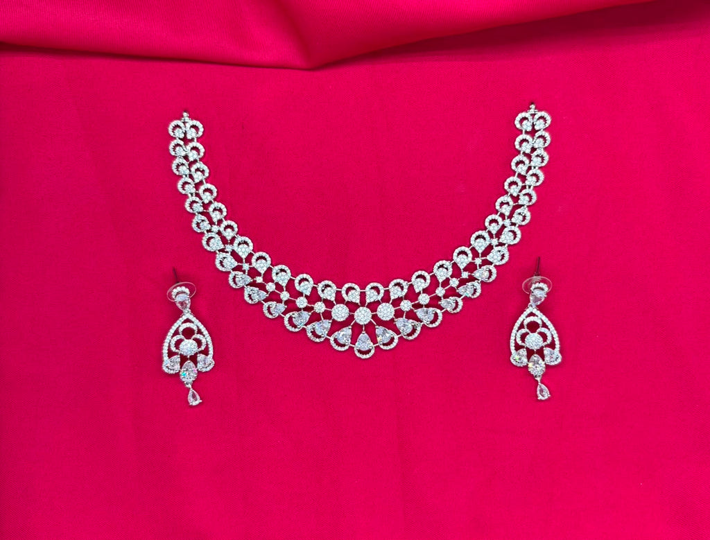 Silver finishing features white rhodium plated zircon with White stones short Necklace